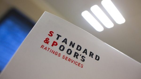 S&P taglia il rating di 11 banche iberiche