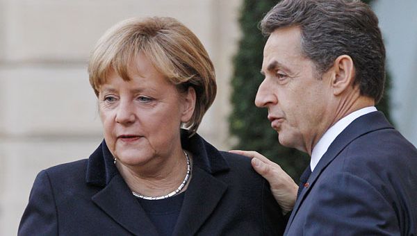 S&P non spegnerà il sorriso di Merkel e Sarkozy